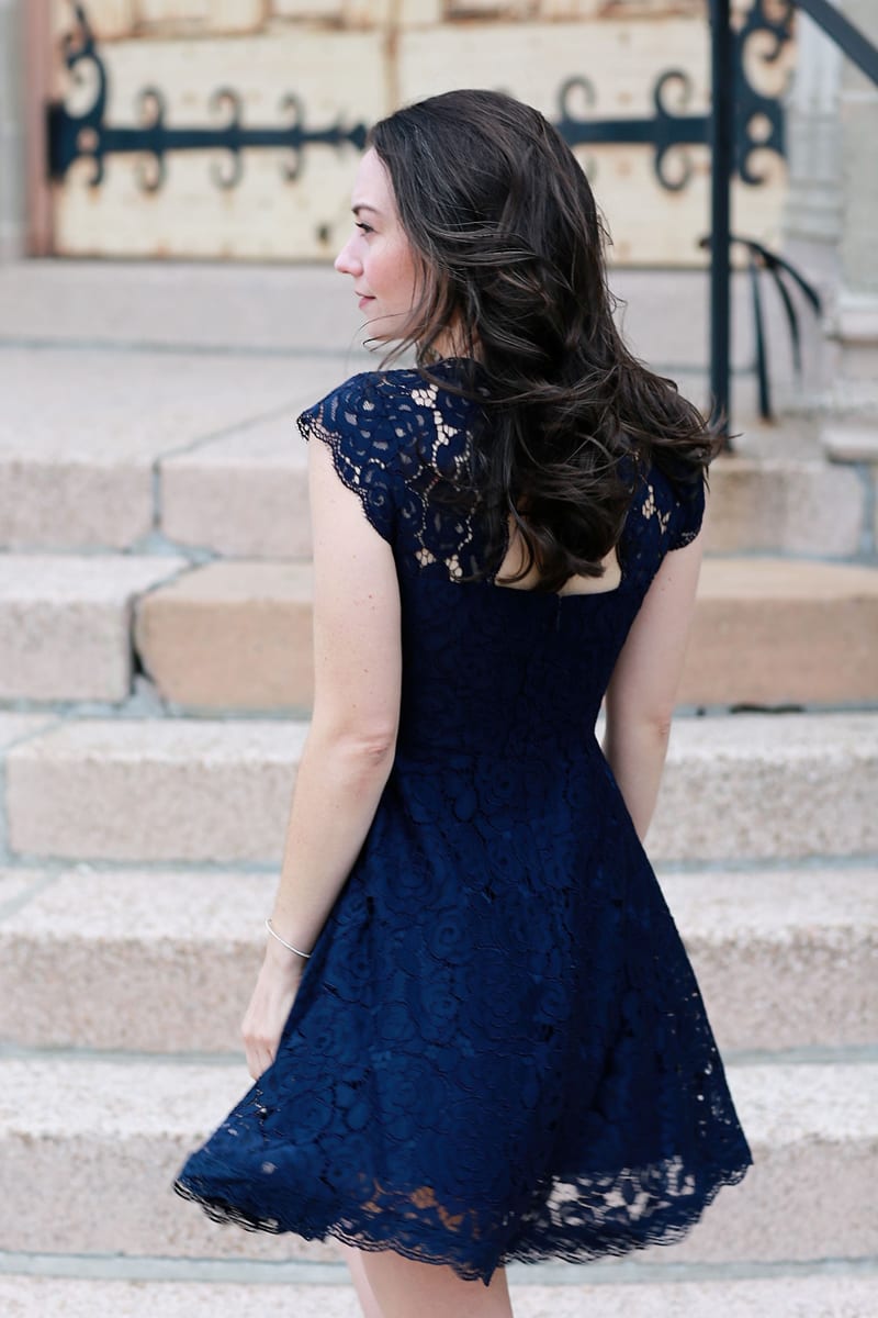 Connecticut fashion blogger Carly Heitlinger wears an navy lace dress