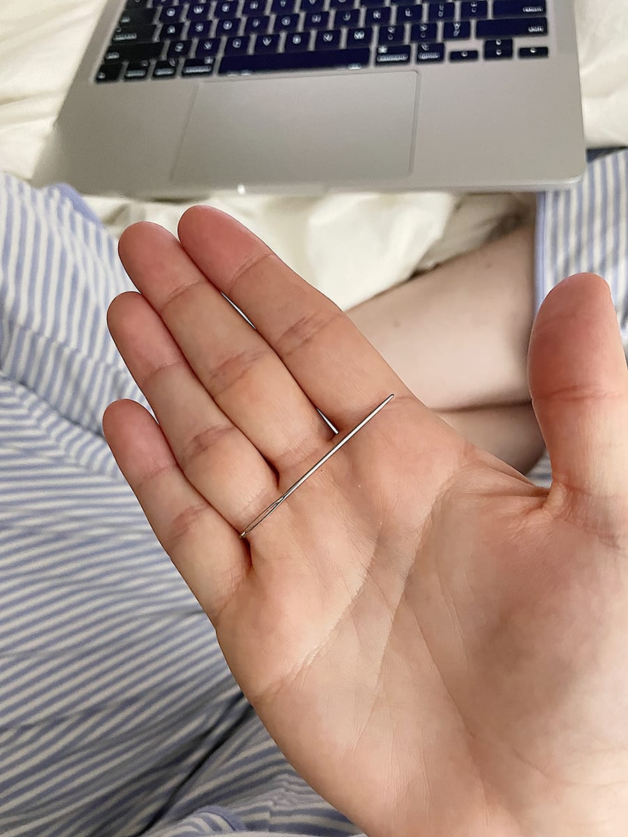 needle on hand