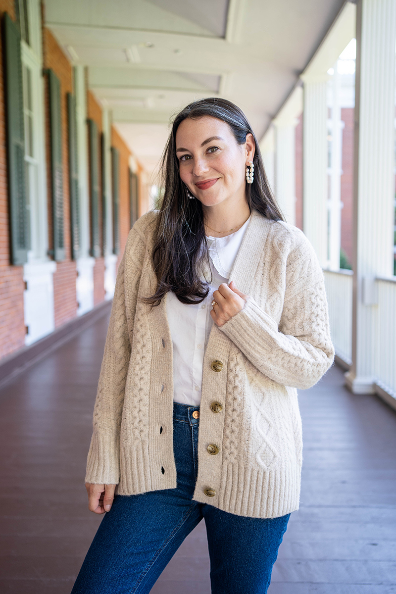 Carly Riordan wearing a J. Crew cable knit cardigan