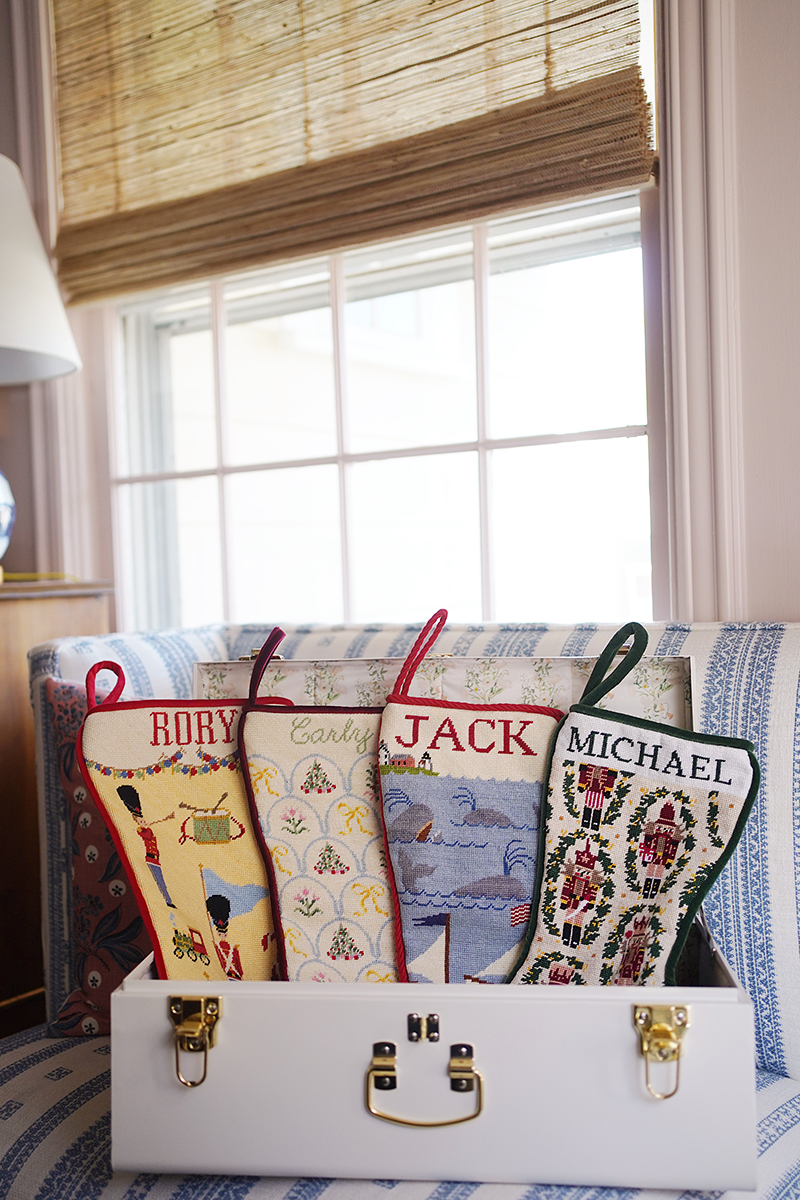 Carly's needlepoint stockings for her family all lined up