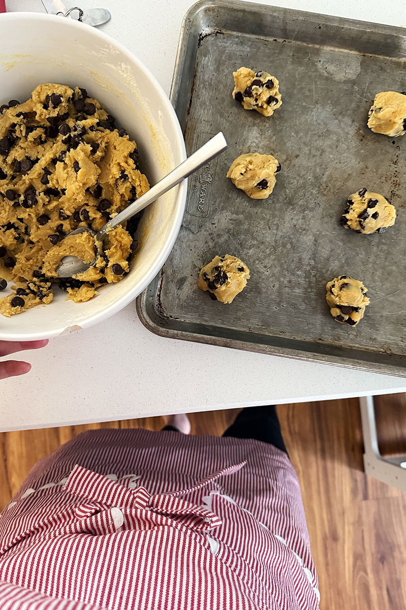 Carly making fresh chocolate chip cookies